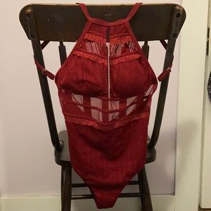 High neck one piece with open back